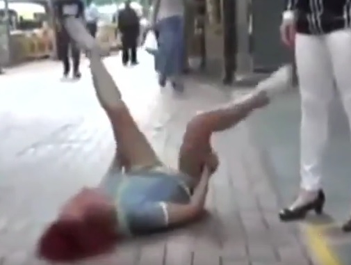 Video: Woman In China Gets Dumped Via Text…Throws 90 Minute Tantrum In Street
