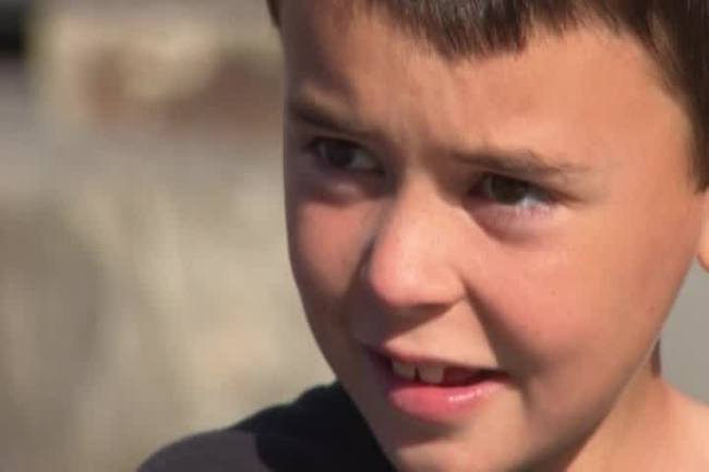 7-year-old boy finds $8k on playground, turns it in